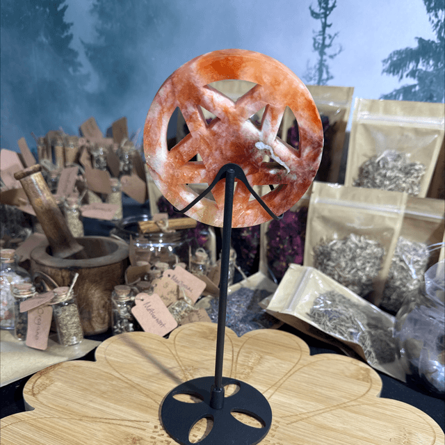 Fire quartz pentagram on stand