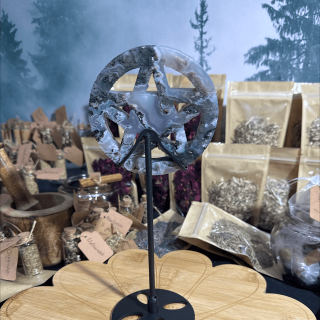 Moss agate pentagram on stand