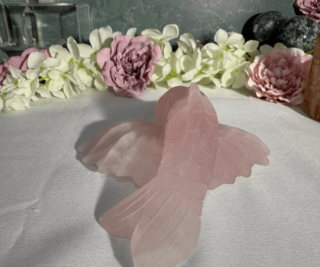Hand carved rose quartz koi carp 