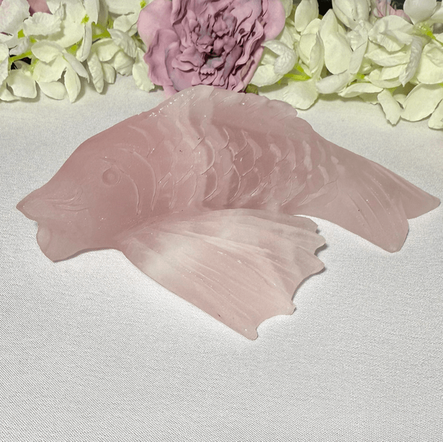 Hand carved rose quartz koi carp 