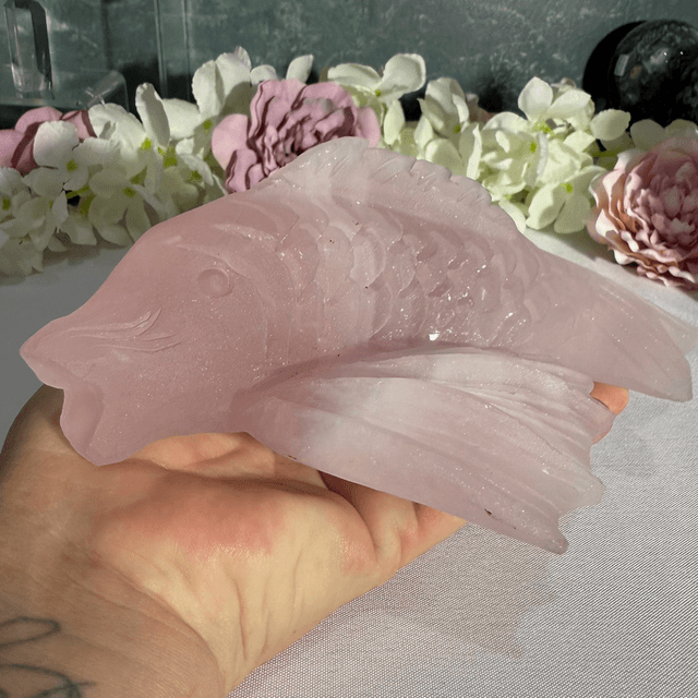 Hand carved rose quartz koi carp 