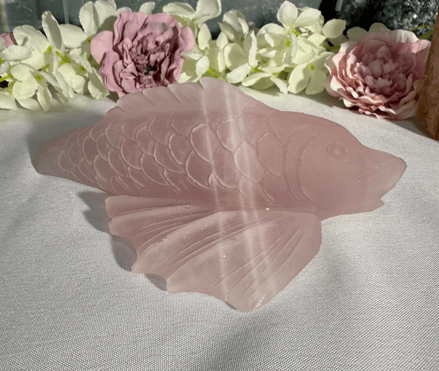 Hand carved rose quartz koi carp 