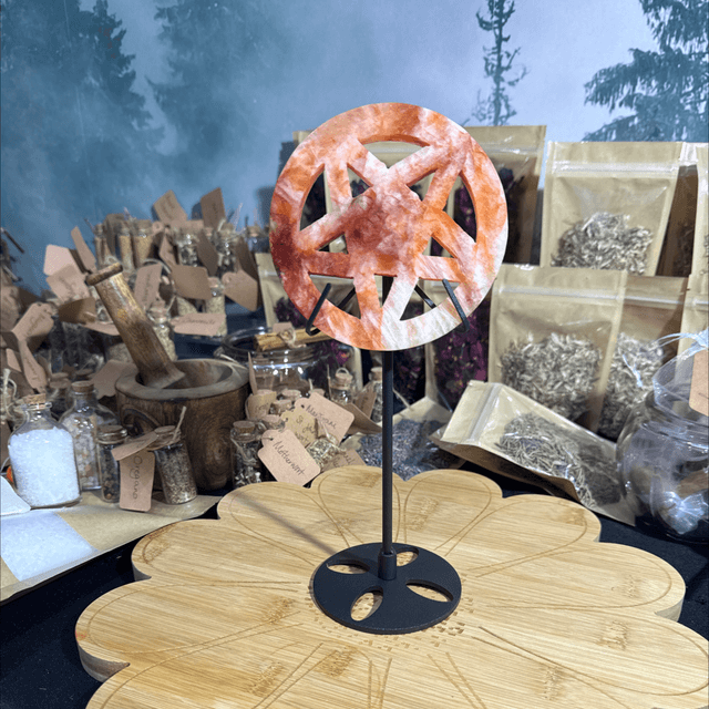 Fire quartz pentagram on stand