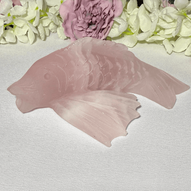 Hand carved rose quartz koi carp 